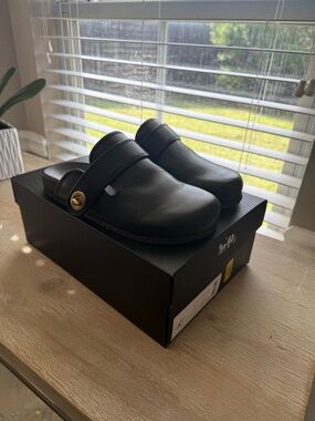 Coach Black Leather Slip-On Mules with Gold-Tone Accent